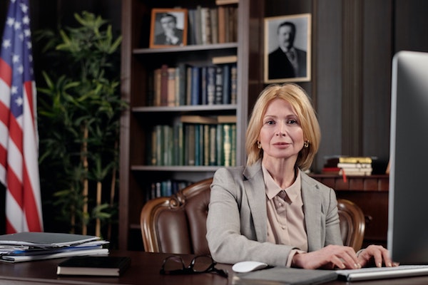 businesswoman-sitting-in-her-office-4427506.jpg