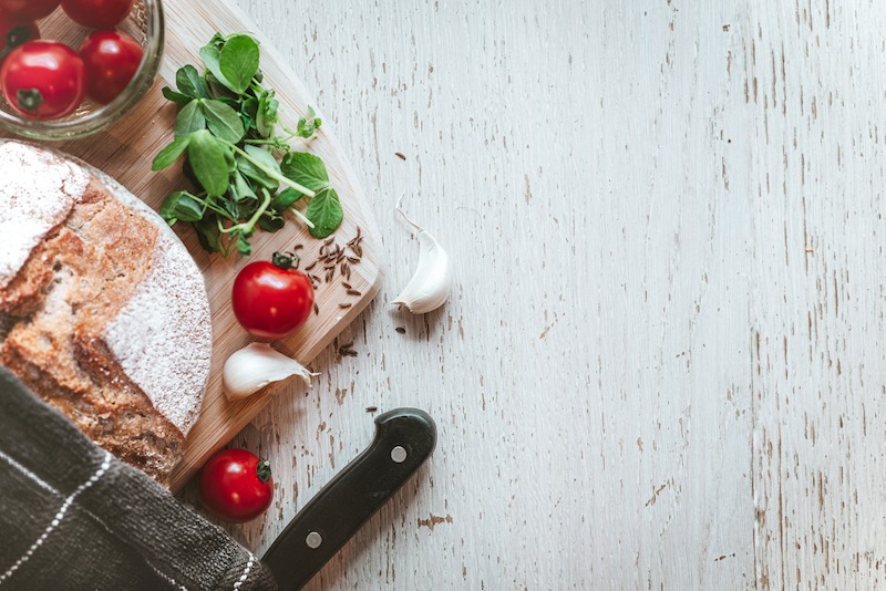 homemade-bread-with-wooden-background-texture-space-for-text-picjumbo-com.jpg