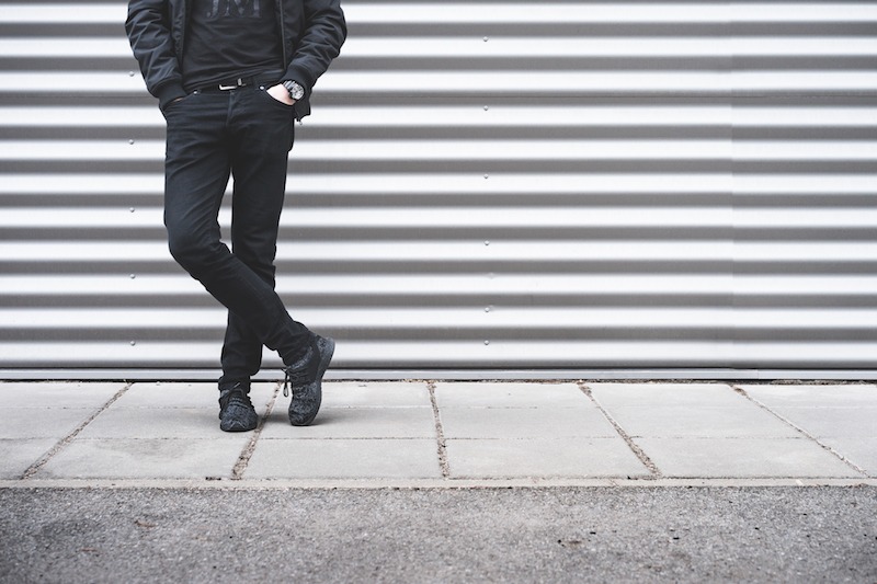 man-standing-in-front-of-metallic-wall-picjumbo-com.jpg